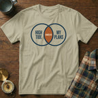Tan t-shirt with Venn diagram graphic: "HIGH TIDE," "MY PLANS," and "CANCELED."