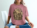 T-shirt with raccoon holding a boot and text "A.F.O.G. Another Fine Outdoor Gaff".
