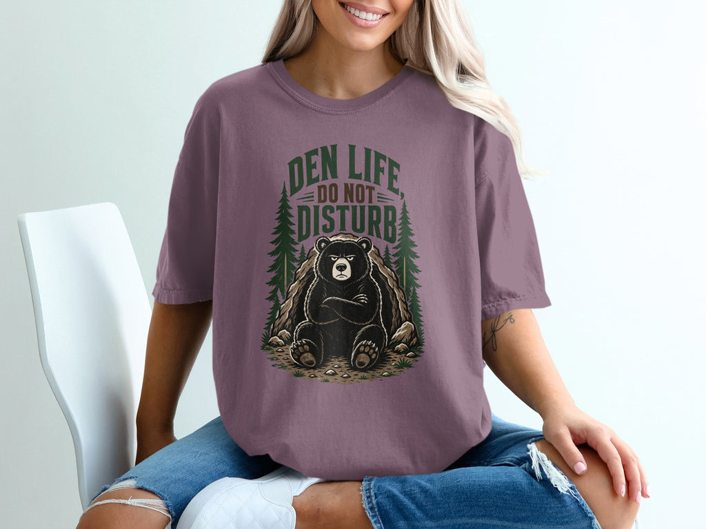 Bear sitting at den entrance with text "Den Life Do Not Disturb"
