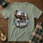 Bigfoot holding a smartphone in a snowy mountain landscape with the text "Who's Blurry Now?".