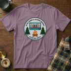 T-shirt graphic with retro cassette, campfire, and "Adventure Awaits" text.