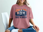 Pink t-shirt with vintage cassette tape graphic and "CHASE THE HORIZON" text.