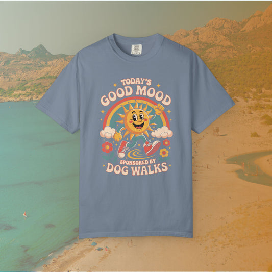 blue t-shirt Retro 70s-style graphic t-shirt featuring a running, happy cartoon sun in sneakers under a rainbow and clouds. The slogan reads: "TODAY'S GOOD MOOD SPONSORED BY DOG WALKS."