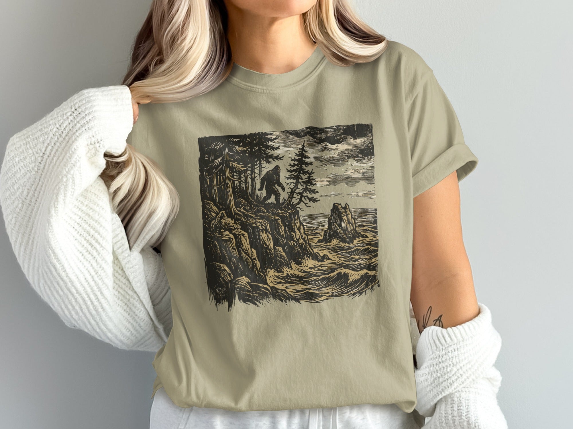 Bigfoot stands on a rocky cliff overlooking a stormy sea, sketch art.