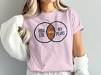 Pink t-shirt with Venn diagram graphic reading "High Tide" and "My Plans" with "Canceled" in the intersection.
