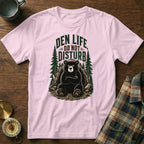 Pink t-shirt with a bear graphic and text "DEN LIFE DO NOT DISTURB".