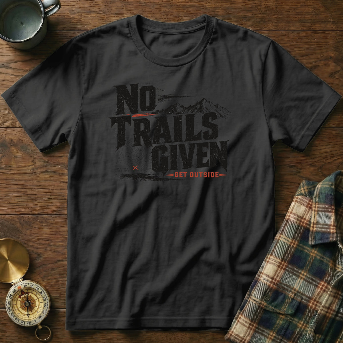 Black t-shirt with "NO TRAILS GIVEN" graphic and mountains, plus "GET OUTSIDE".