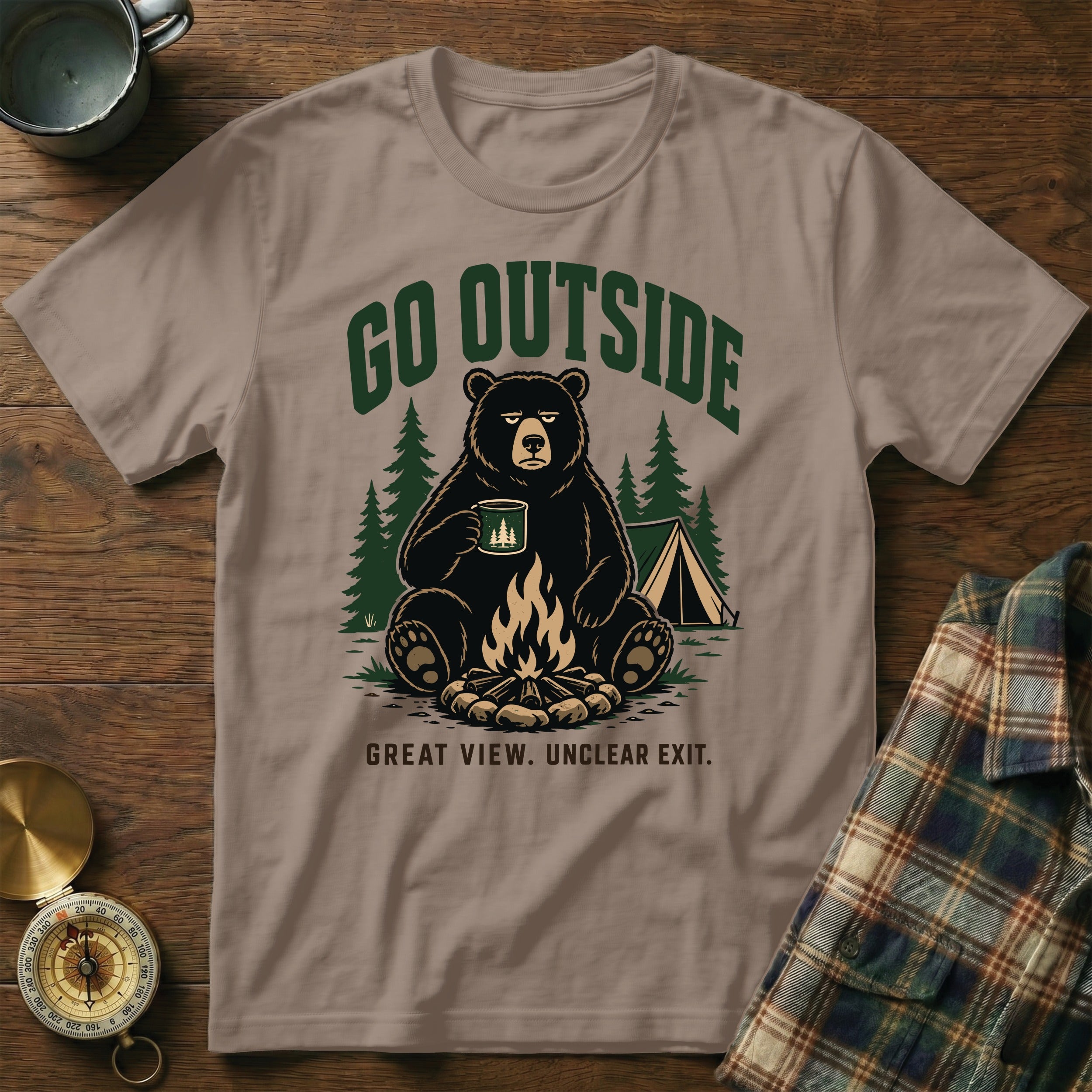 T-shirt with a bear holding a mug by a campfire, saying "GO OUTSIDE GREAT VIEW. UNCLEAR EXIT."