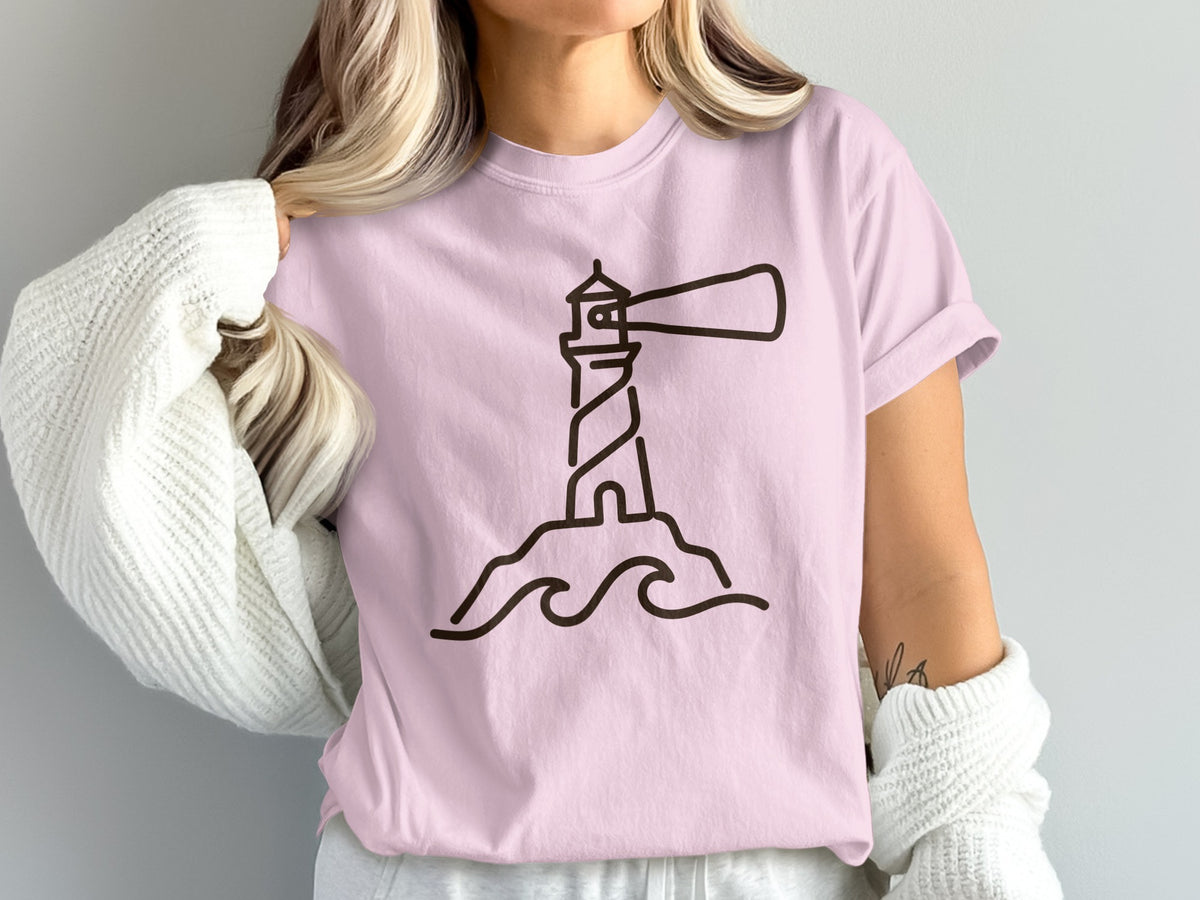 Pink t-shirt with a minimalist lighthouse graphic and wavy lines.