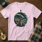 Pink t-shirt with a circular graphic of an oar in crashing waves.