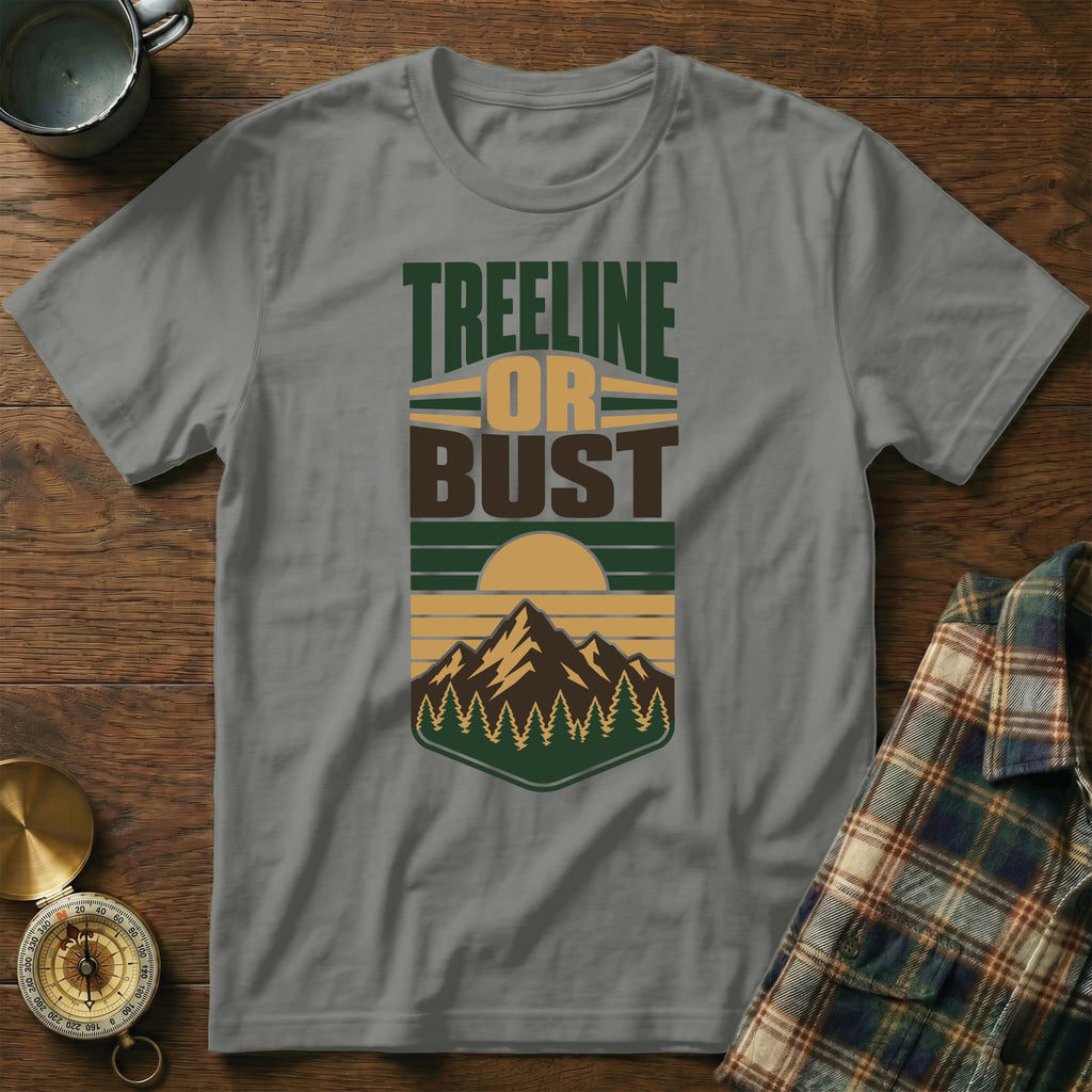 Gray t-shirt with "Treeline Or Bust" text and mountain landscape design.