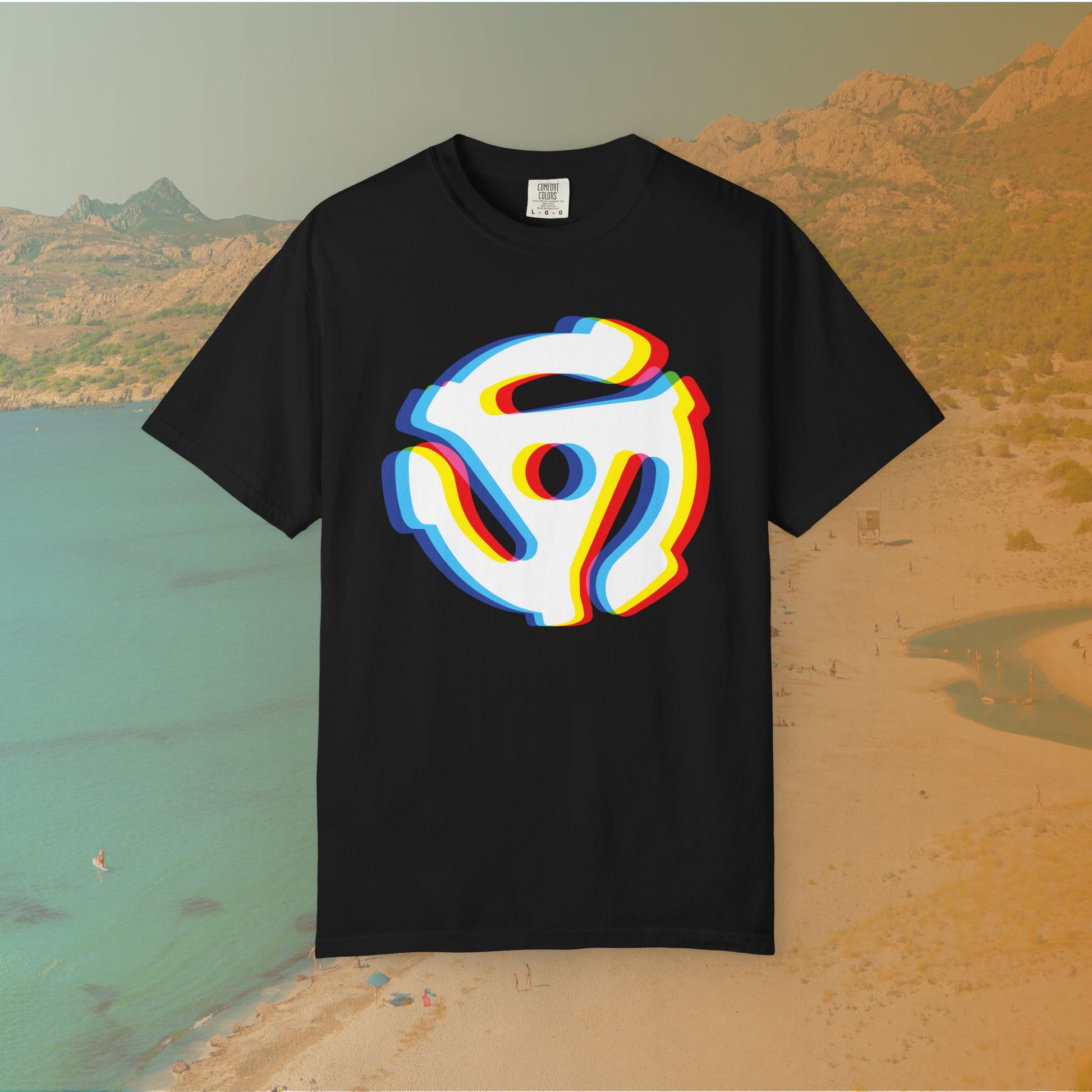 black t-shirt with a graphic of a white 45 RPM vinyl record adapter (dink) with a red, yellow, blue, and cyan chromatic aberration/glitch effect, ready for EDM festival apparel