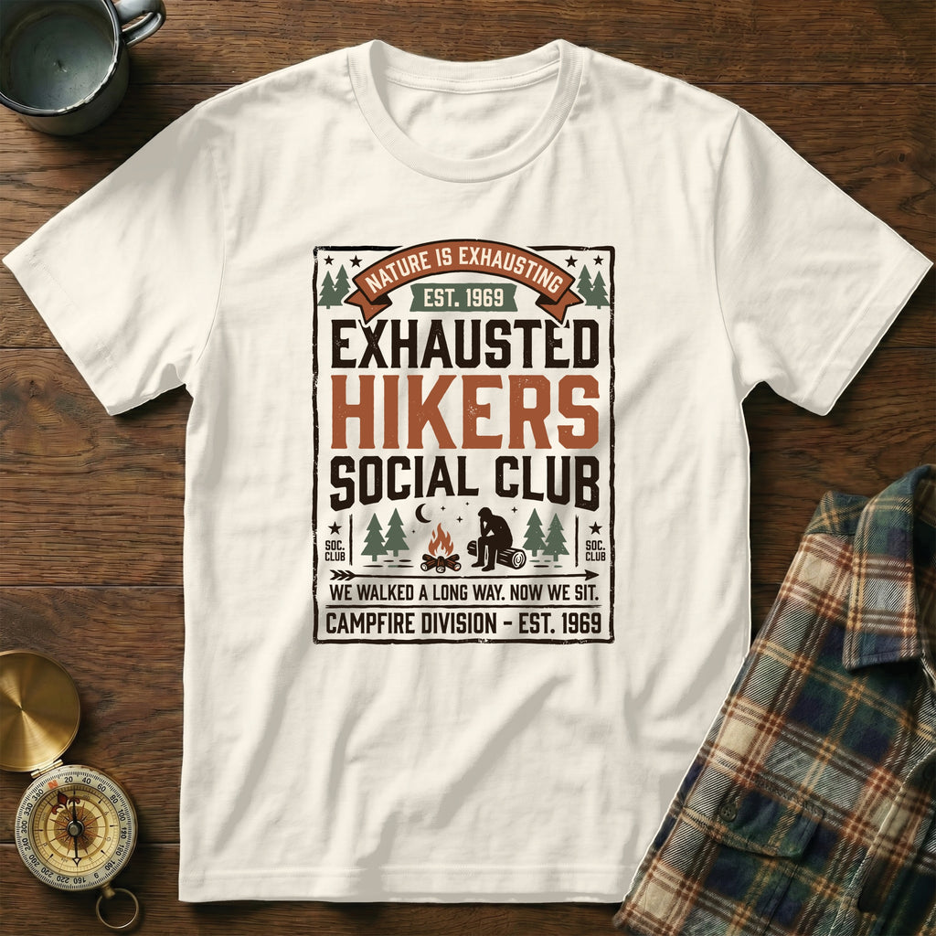 White t-shirt with "Exhausted Hikers Social Club" nature graphic.