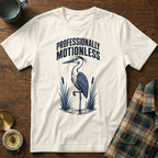 Cream t-shirt with heron graphic and text "Professionally Motionless".