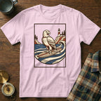 Eagle surfing on a wave with lighthouse and trees in vintage style graphic.
