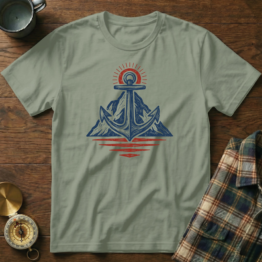 T-shirt with blue anchor and sun over mountains graphic.