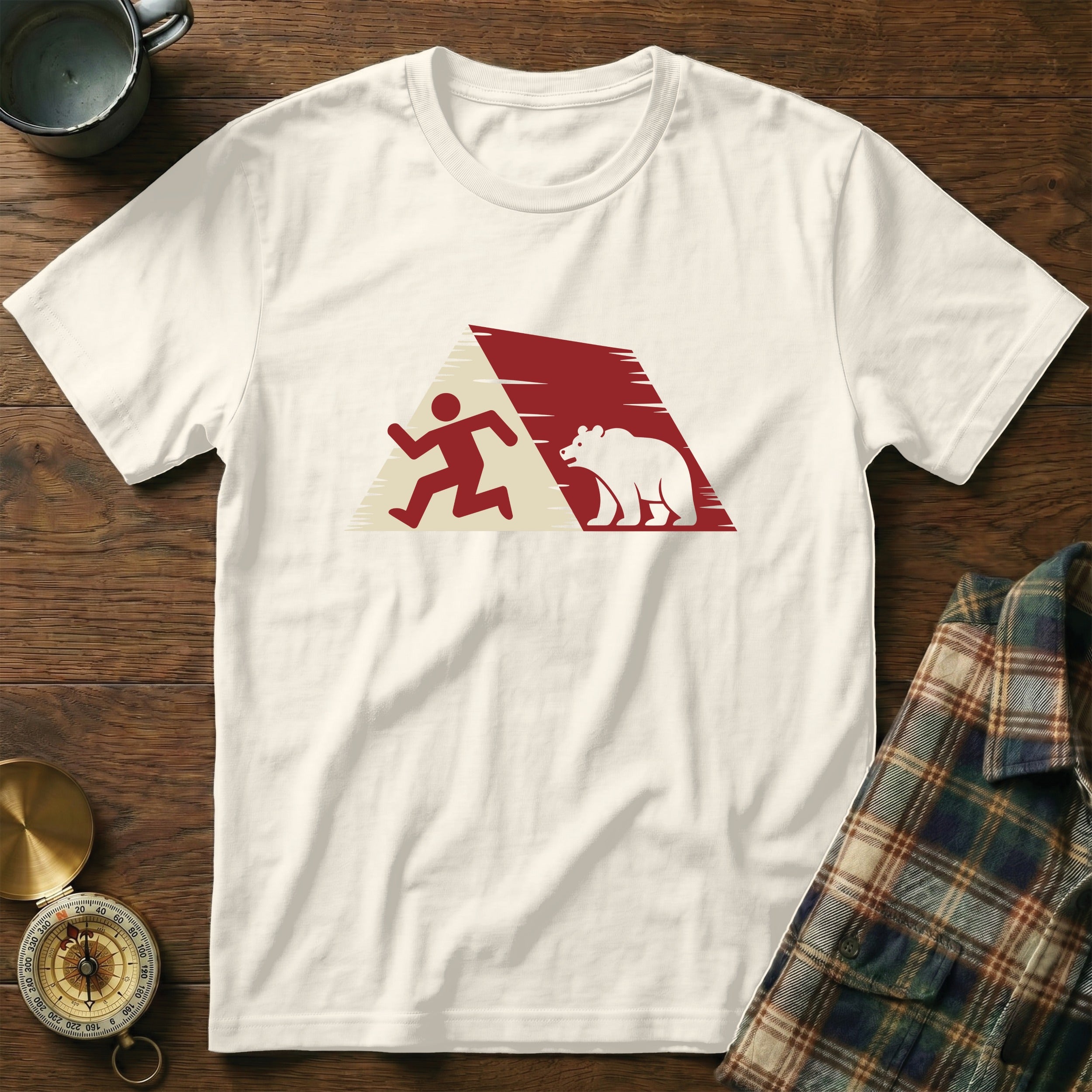 White t-shirt with a graphic of a runner and a bear within a red triangle.