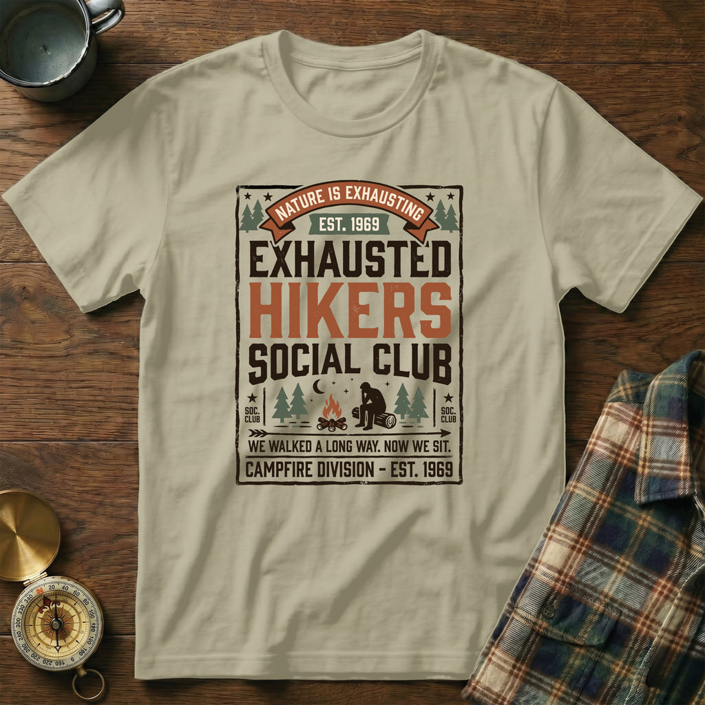 "Nature is Exhausting" slogan t-shirt with campfire and hiker graphic.