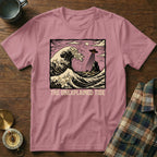 T-shirt with "The Unexplained Tide" text over a wave with a UFO.