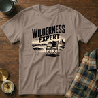 T-shirt with "WILDERNESS EXPERT" text and a beach chair scene.