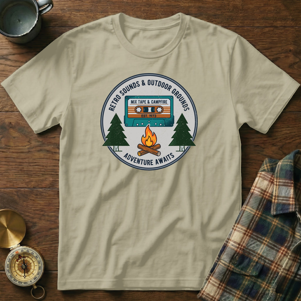 T-shirt with Retro Sounds & Outdoor Grounds logo, mixtape, campfire, and trees.