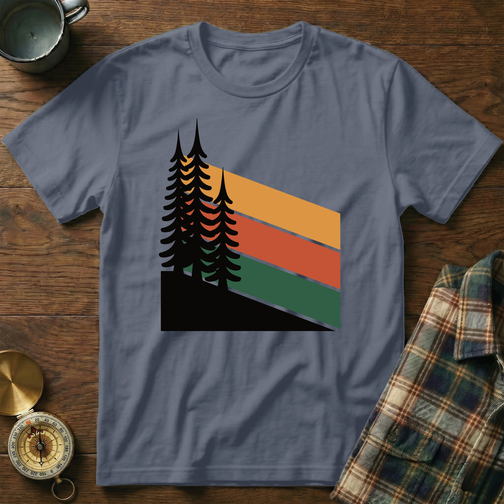 Striped t-shirt with silhouetted pine trees and colorful horizontal stripes.
