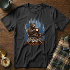 Black t-shirt with illustration of a bear sitting in a camping chair with a mug.