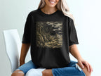 Black t-shirt with a dark, stormy seascape illustration.
