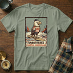 Eagle wearing hat and striped shirt surfing, text "Unbothered Coastal Americana".