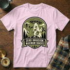 Pink t-shirt with alien taking selfie with snacks under UFO, says "Zero Invasion. Maximum Snacks."