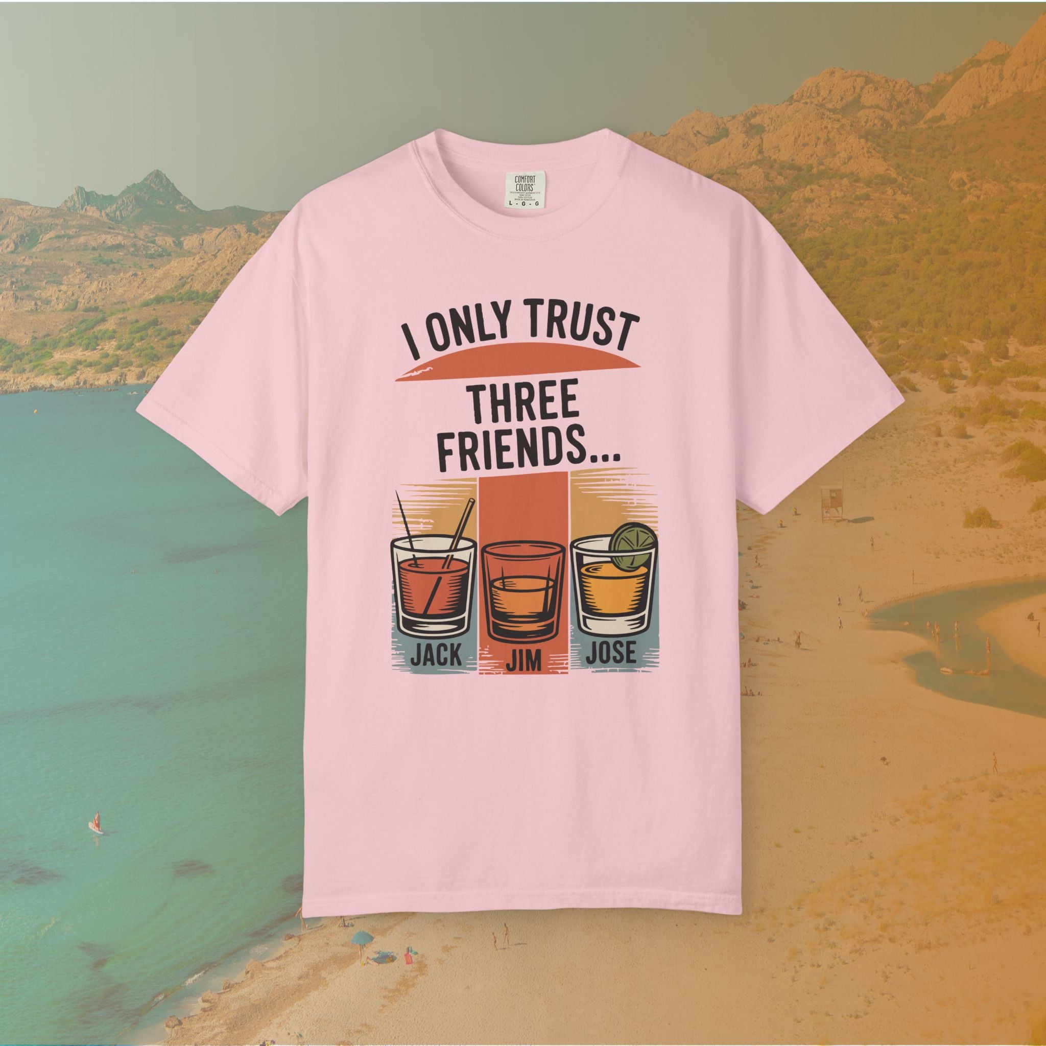 pink  t-shirt Graphic T-shirt featuring three illustrated drinks on retro color panels labeled "JACK," "JIM," and "JOSE." The text above reads: "I ONLY TRUST THREE FRIENDS"