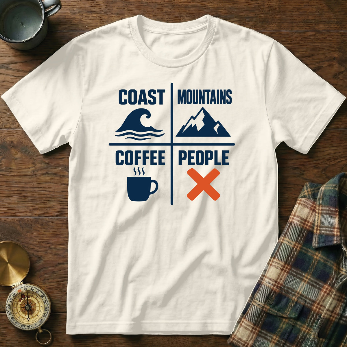 White t-shirt with "Coast Mountains Coffee People" and icons: wave, mountain, coffee cup, x.