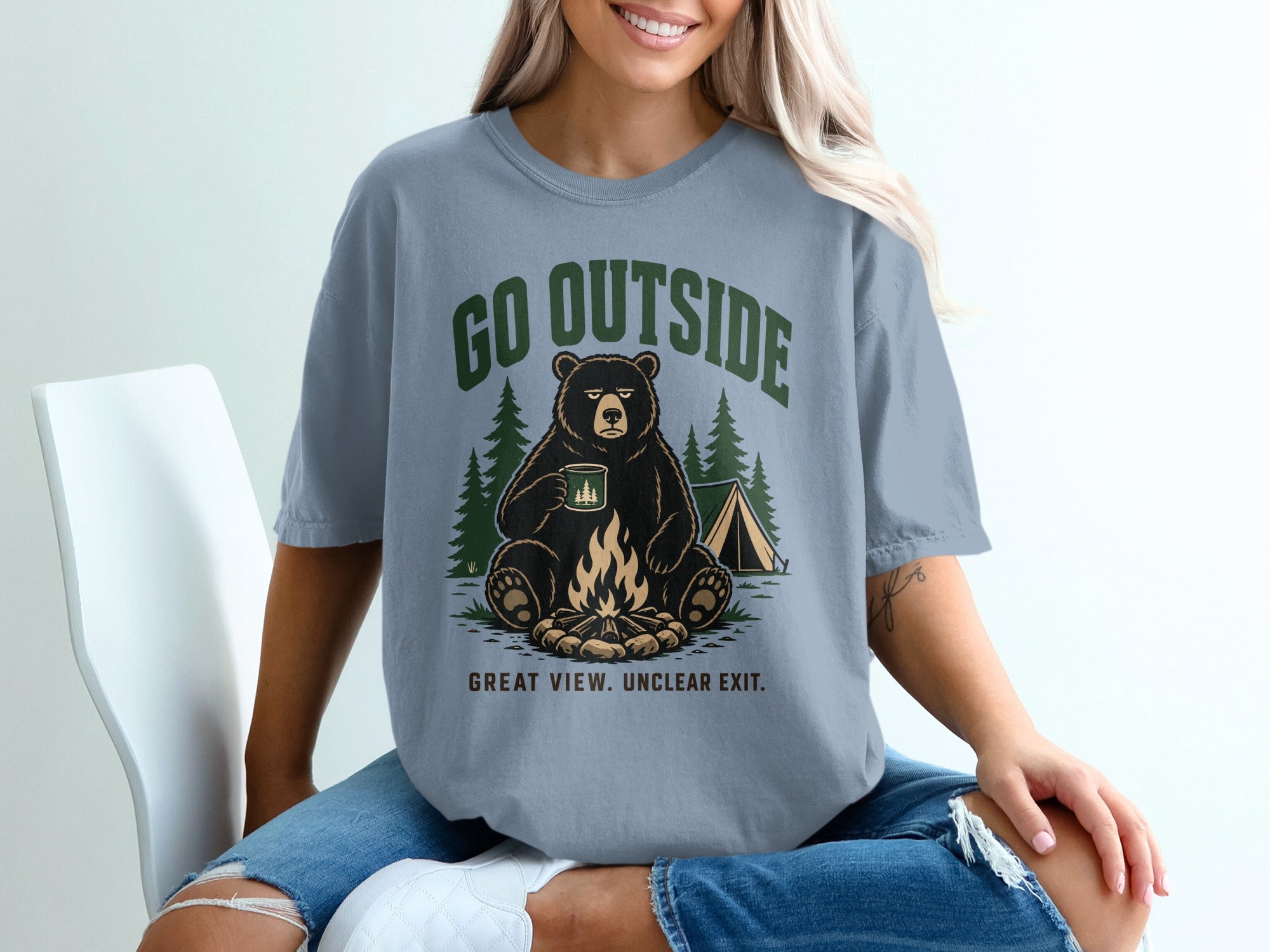 Bear sitting by campfire with text "GO OUTSIDE, GREAT VIEW. UNCLEAR EXIT."