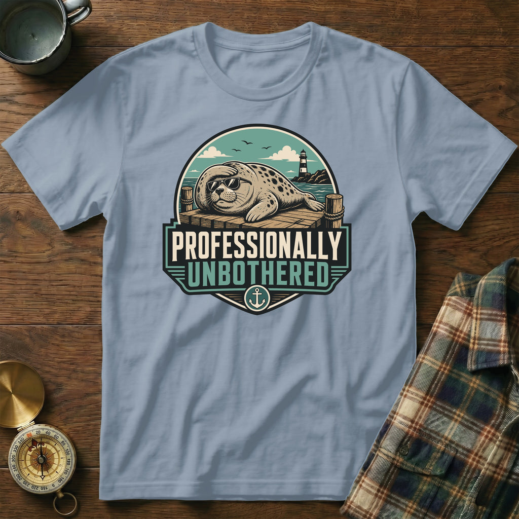 Seal wearing sunglasses on a dock with lighthouse and text "Professionally Unbothered".