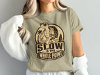 T-shirt graphic features a turtle wearing sunglasses and text "SLOW IS THE WHOLE POINT".