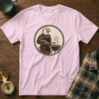 Eagle grilling at a barbecue, printed on a pink t-shirt.
