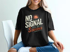 Black t-shirt with "NO SIGNAL STILL GOT SUNBURNED" text and sun graphic.