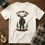 White t-shirt with a graphic of a moose wearing a jacket and text "I'VE SEEN SOME THINGS".