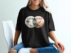Black t-shirt with graphic that reads "Sleep In Regret Go Hiking".