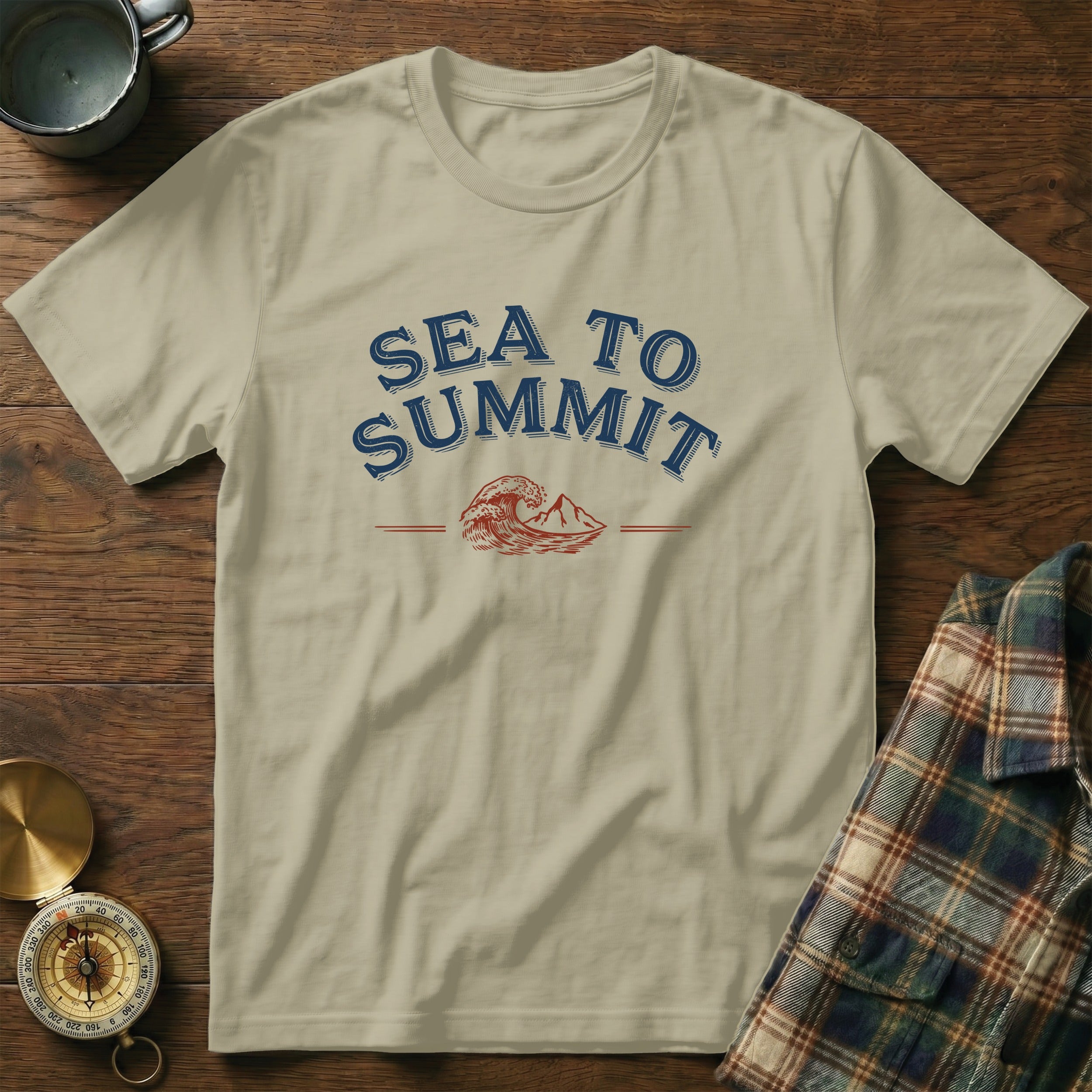 Tan t-shirt with "Sea to Summit" text, mountain, and wave graphics.