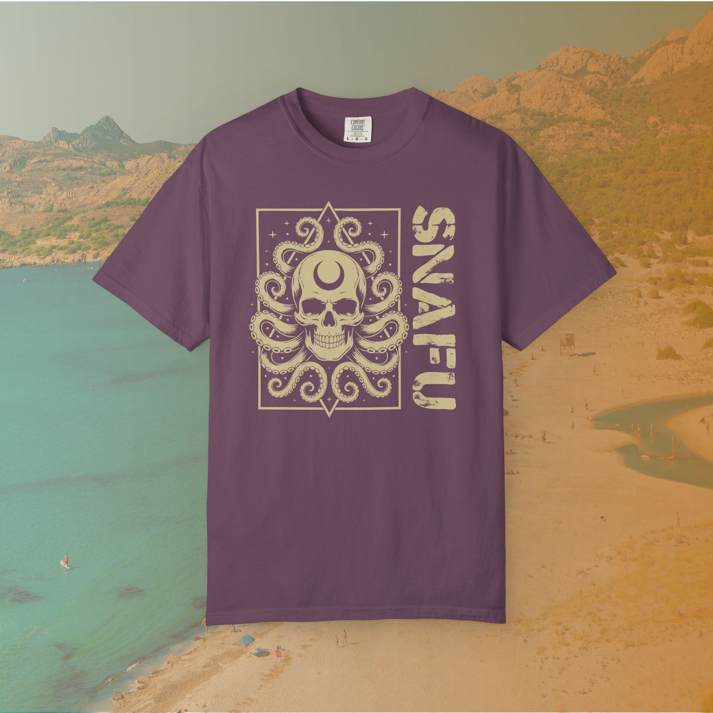 Purple t-shirt with a skull design and 'SNAFU' text on a scenic background