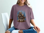 Bear sitting in chair holding coffee mug with pine trees background.