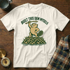 White t-shirt with a beaver illustration and "BUILT THIS DAM MYSELF" text.