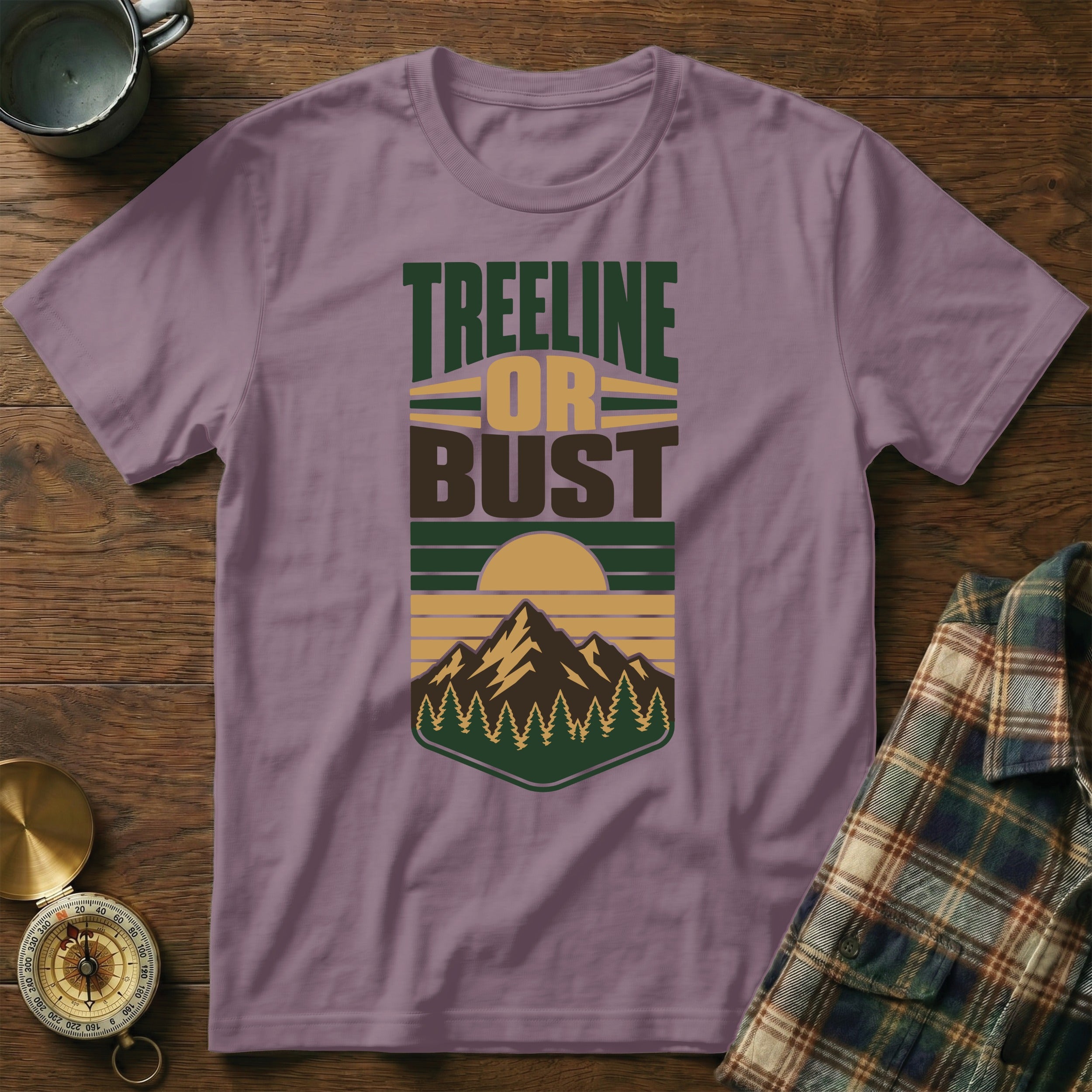 T-shirt with "TREELINE OR BUST" graphic featuring mountains and trees.
