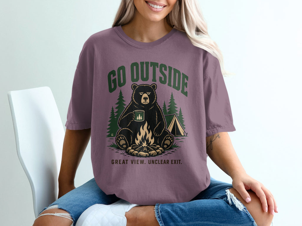 Bear sitting by campfire with tent, "GO OUTSIDE" text, "GREAT VIEW. UNCLEAR EXIT."
