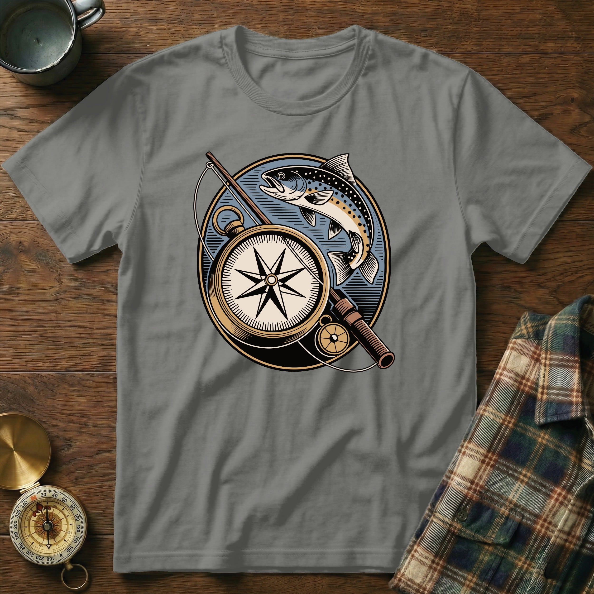 Gray t-shirt with circular fishing and compass graphic featuring a trout.