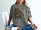 Bigfoot stands on a cliff overlooking a stormy ocean and rocky island.