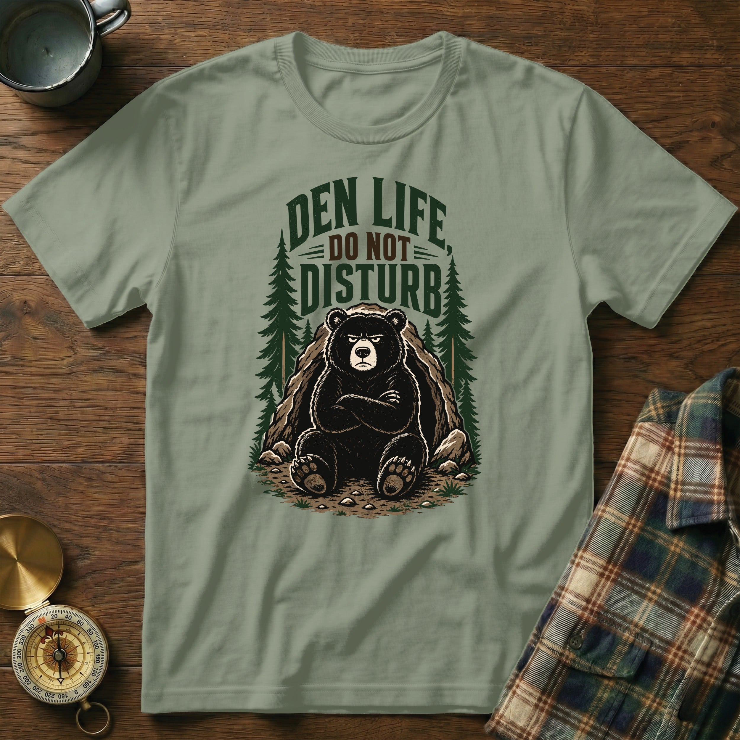 T-shirt with bear illustration and text "DEN LIFE DO NOT DISTURB".