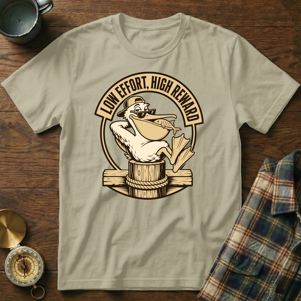 Pelican wearing sunglasses holding fish with text "LOW EFFORT, HIGH REWARD".