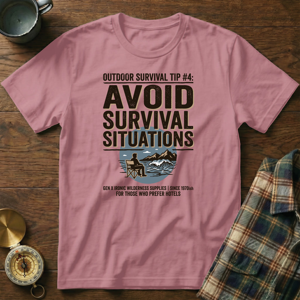 Pink t-shirt with "AVOID SURVIVAL SITUATIONS" text and wilderness graphic.